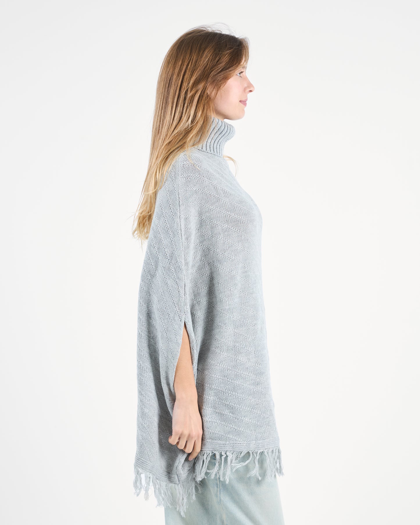 Grey Turtleneck Poncho With Fringe’s