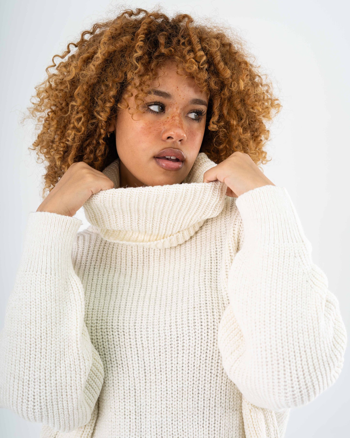 High-Low Turtle-neck Pullover In Offwhite