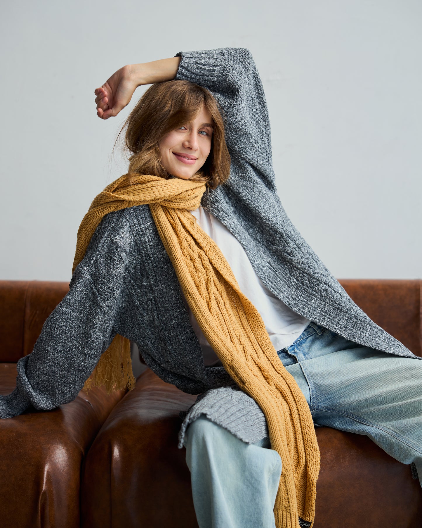 Cable knit scarf in camel