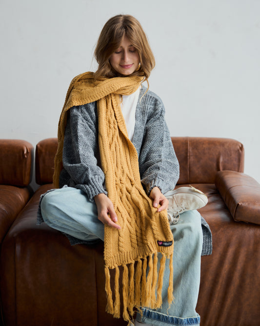 Cable knit scarf in camel