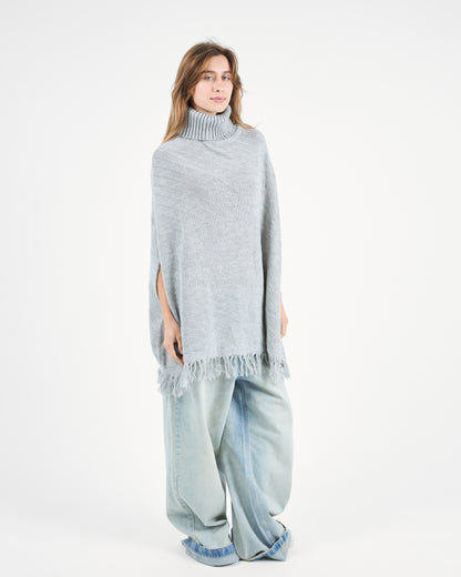 Grey Turtleneck Poncho With Fringe’s