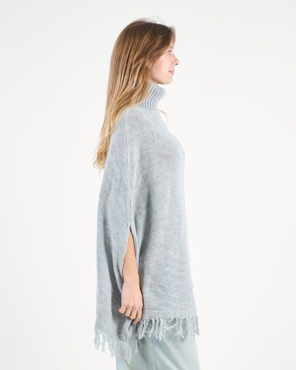 Grey Turtleneck Poncho With Fringe’s