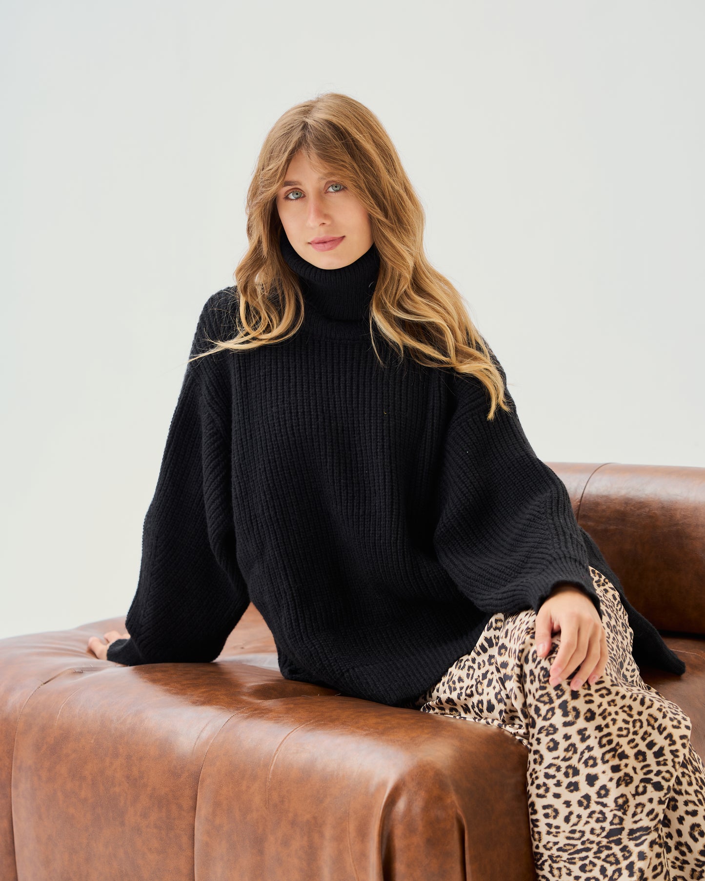 High-Low Turtle-neck Pullover In Black