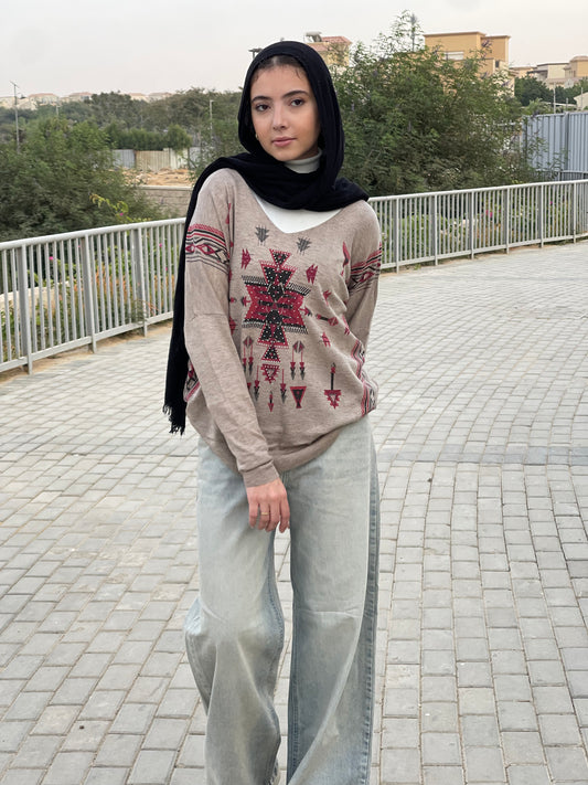 Turkish tribal geometric sweater in cafe