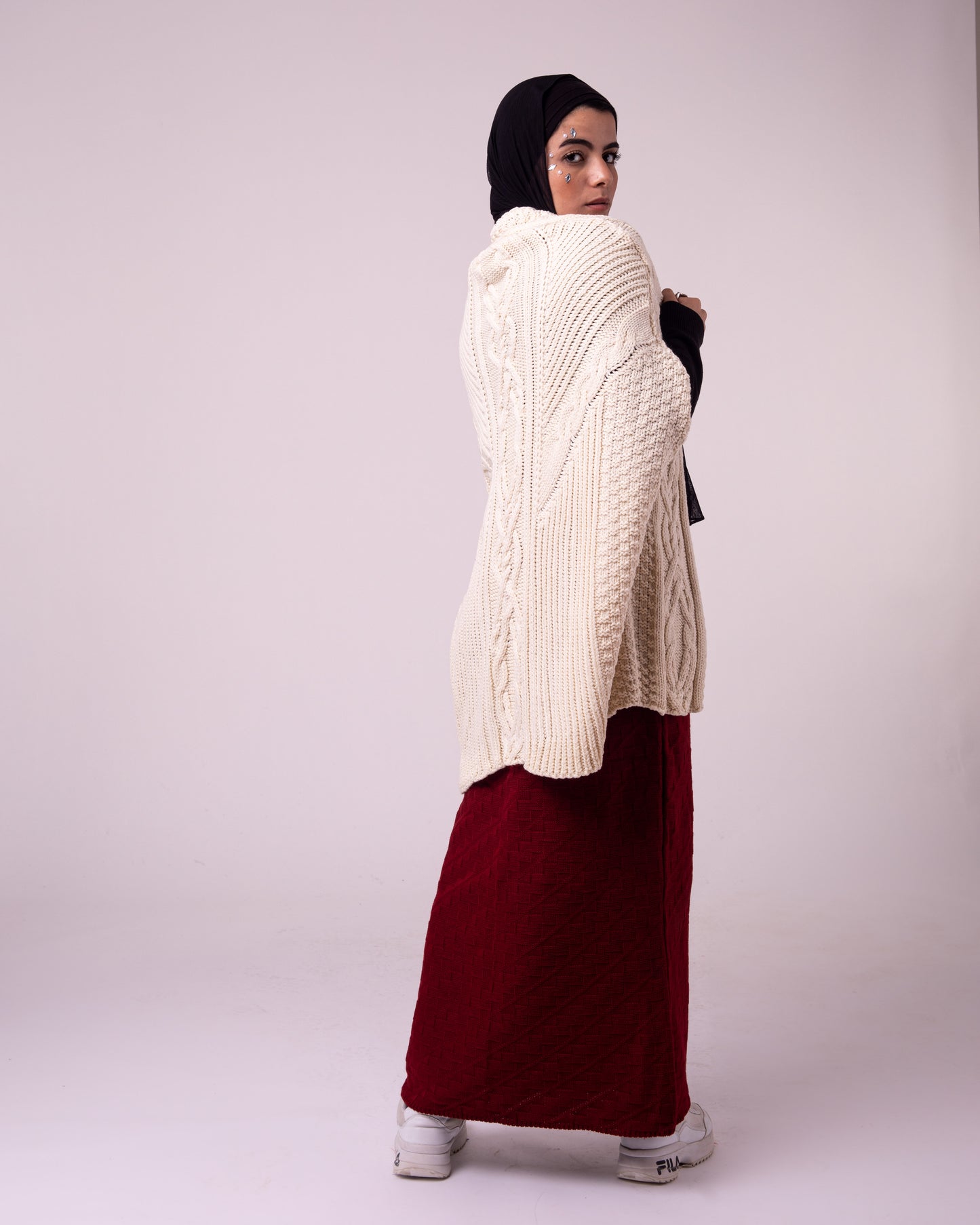 Knitted cap in off white