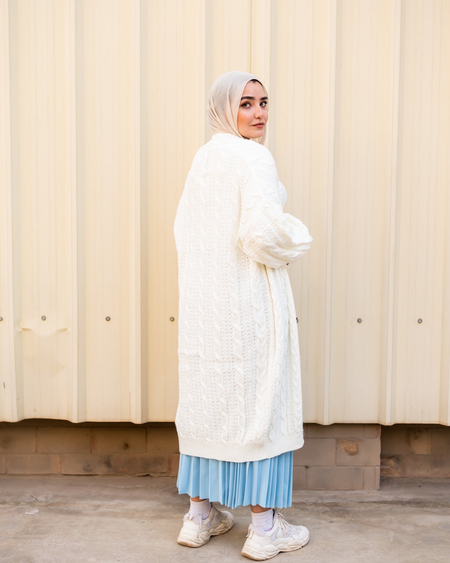 Cable knit cardigan in off white