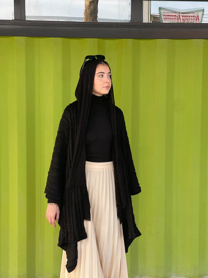 Cable-knitted Cape in black