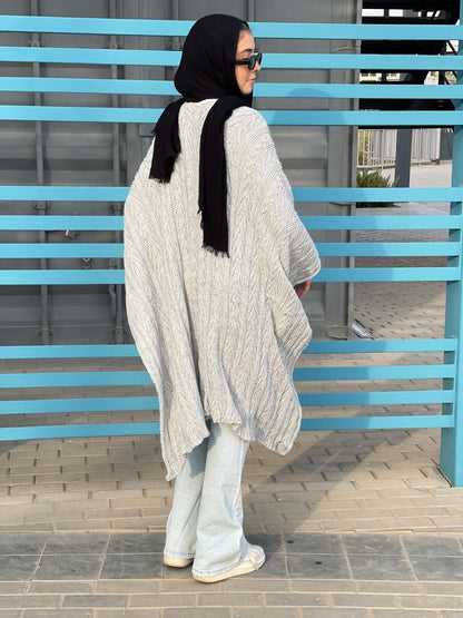 Cable-Knitted Cape in Grey